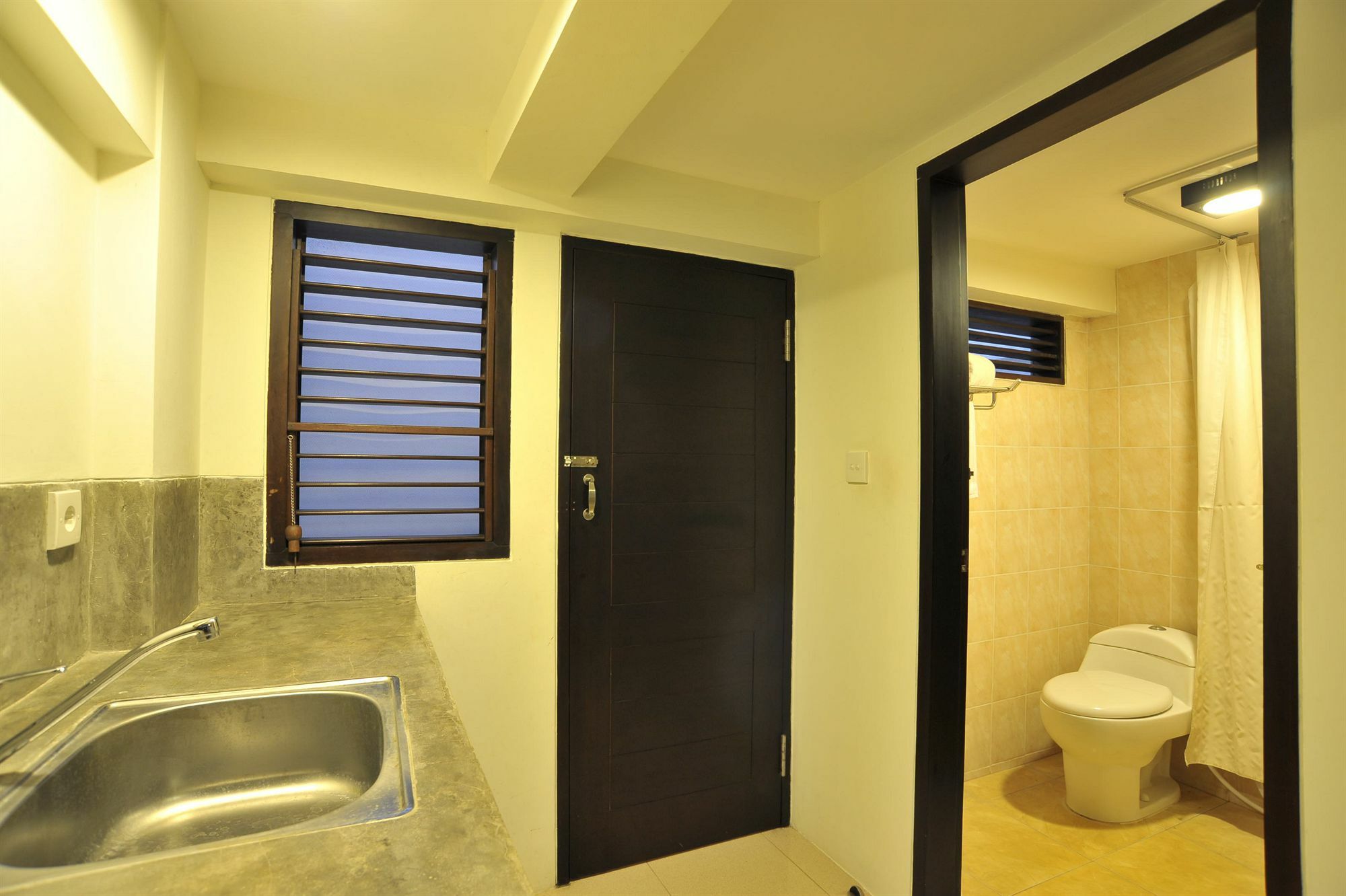 Ganga Hotel & Apartment Denpasa Buitenkant foto